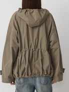 Random Piece Triacetate Blend Jacket With Stowable Hood in Beige - On Model