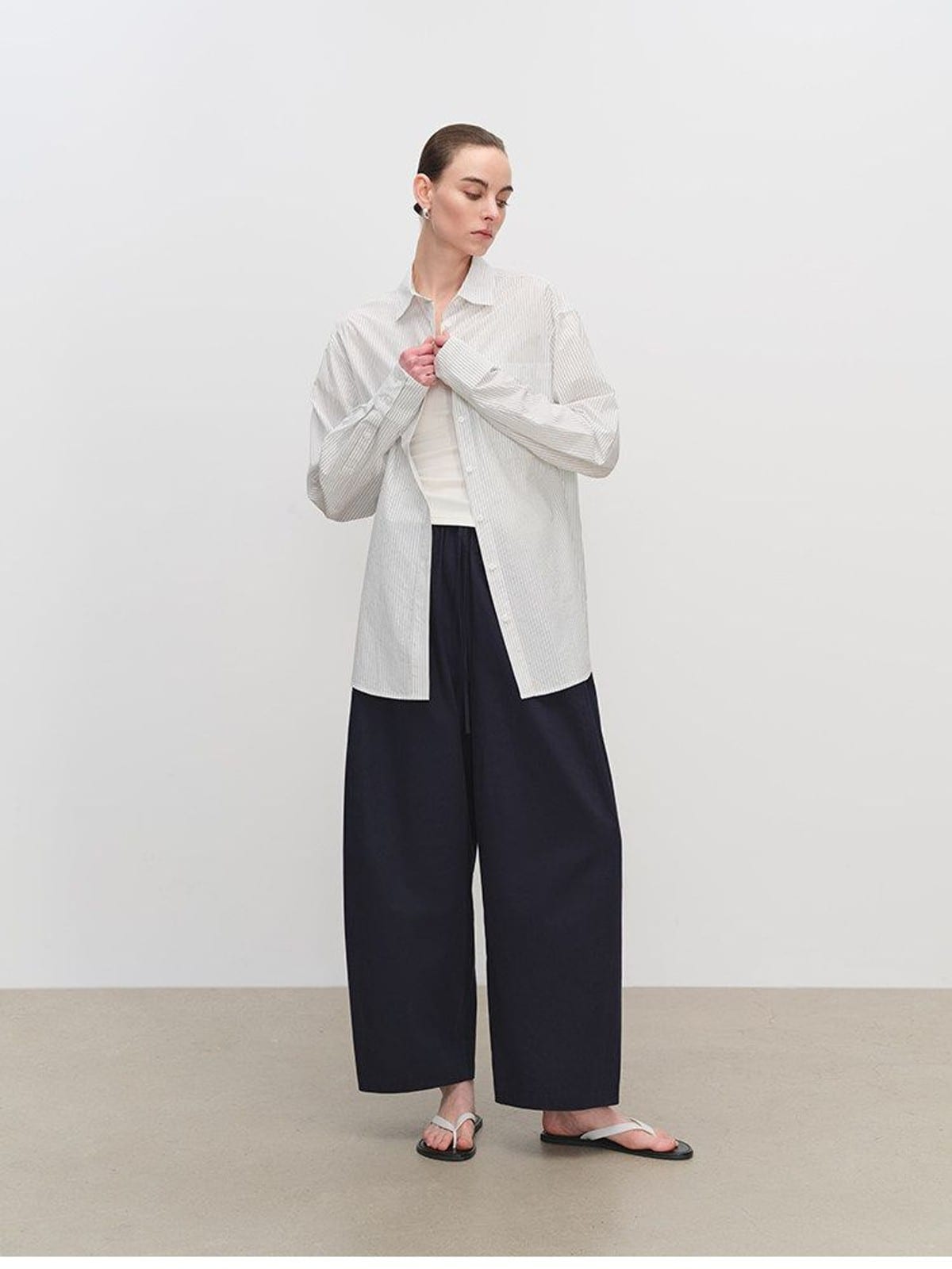 MSBEAST Paper Texture Cotton Balloon Pants in Navy Blue - On Female Model