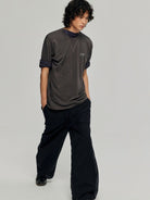 SIMPLE PROJECT Inverted Silver Logo Crewneck T Shirt in Charcoal - On Male Model