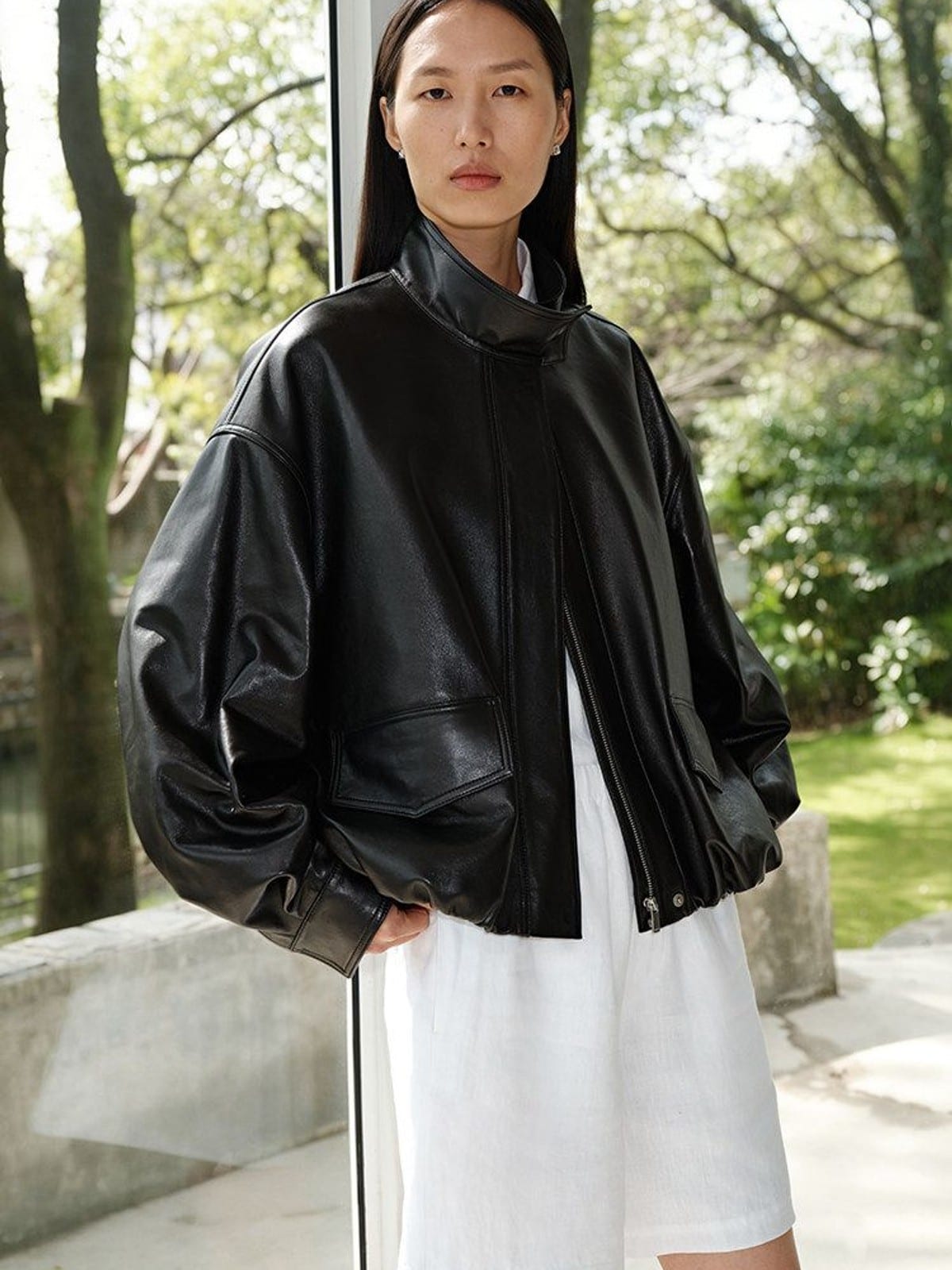 MSBEAST Oil Waxed Sheepskin Stand Collar Jacket in Black - On Female Model