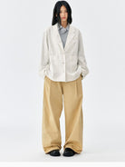 MEDM Embroidered Cotton Cargo Pants in Beige - On Female Model