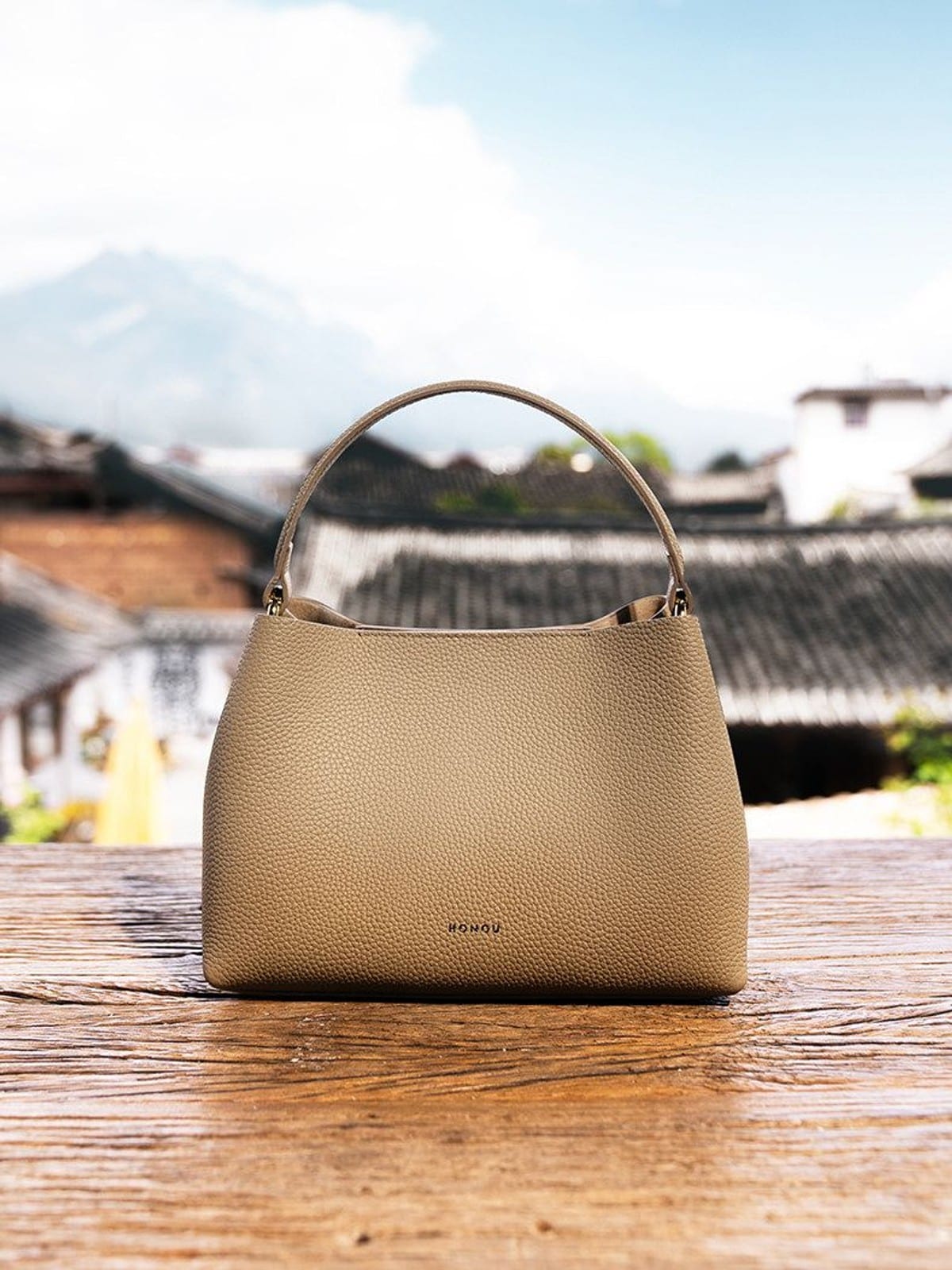 HONGU Cowhide Crossbody Bucket Bag in Taupe - Lifestyle