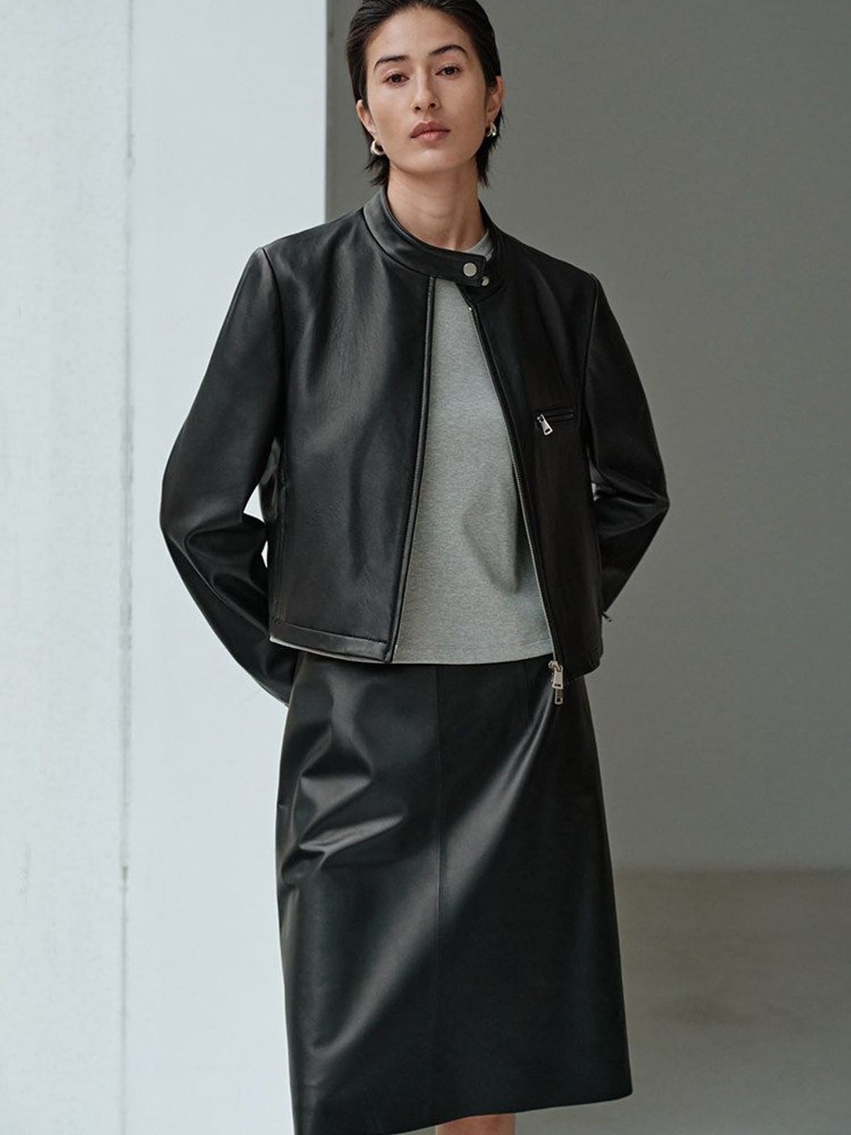 MSBEAST Suede Leather Cropped Moto Jacket in Black - On Female Model