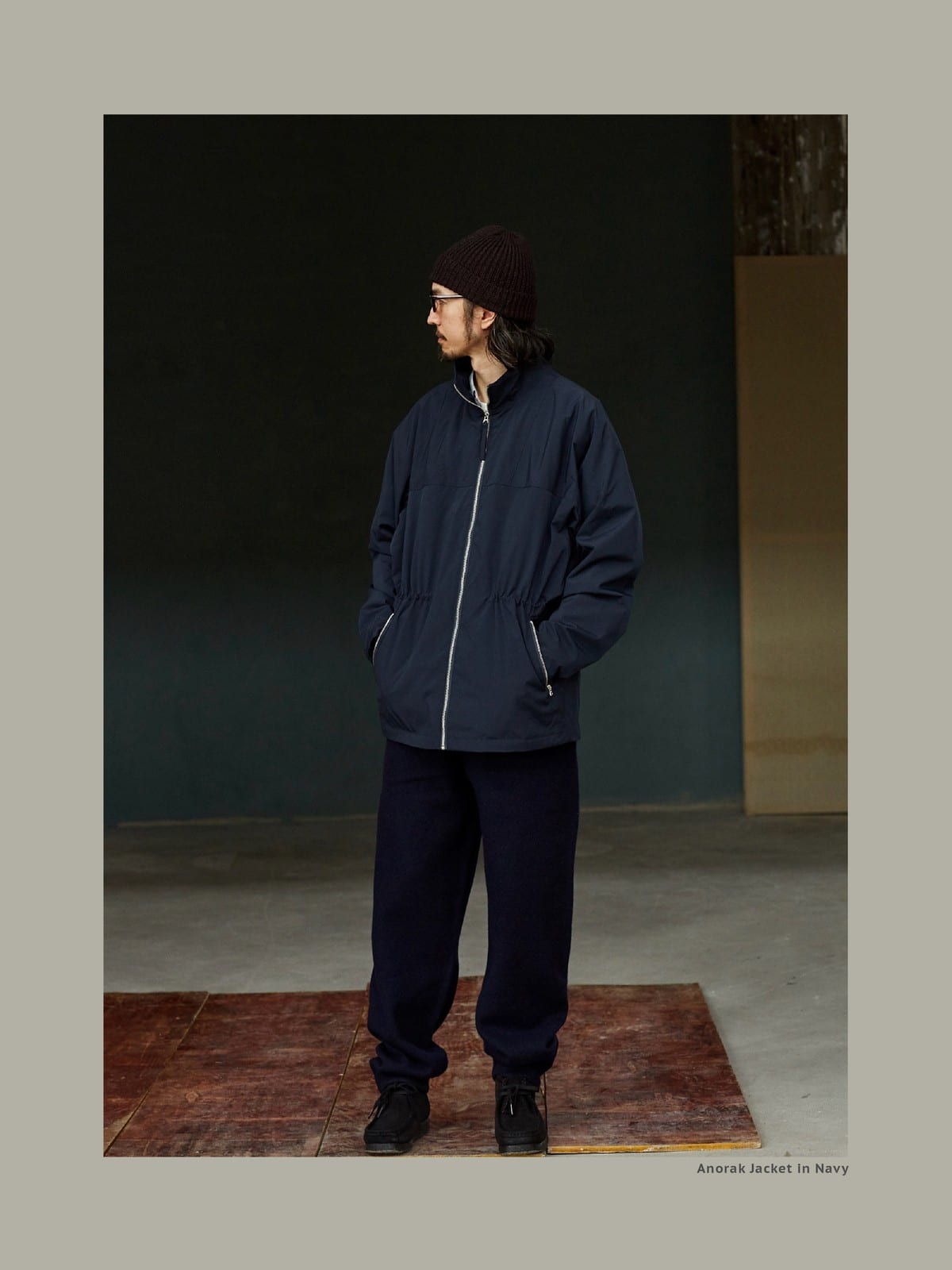 USAGE Drawstring Zip Front Tech Anorak in Navy Blue - On Male Model