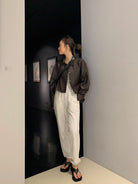 MSBEAST Cropped Sheepskin Leather Shirt Jacket in Brown - On Female Model
