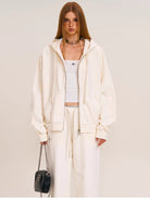 SMFK Washed Cotton Zip Up Hoodie in White - On Female Model