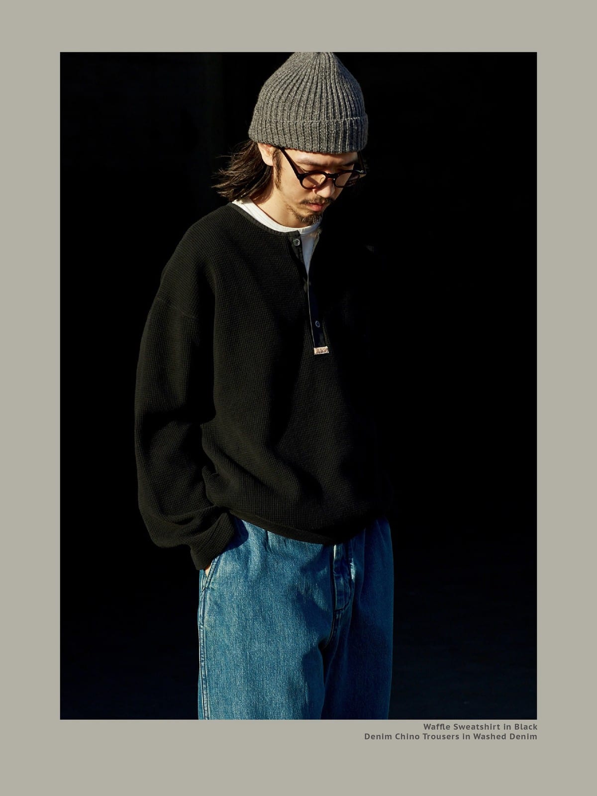 USAGE Heavyweight Waffle Knit Henley Sweatshirt in Black - On Male Model