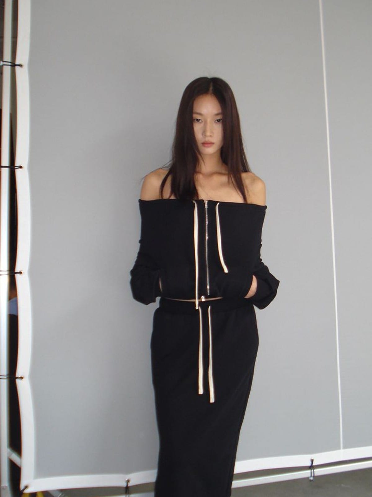 RARELY ALIKE Off Shoulder Zip Up Sweatshirt in Black - On Female Model