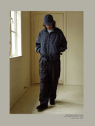 USAGE Jacquard Check Harrington Jacket in Navy Blue - On Male Model