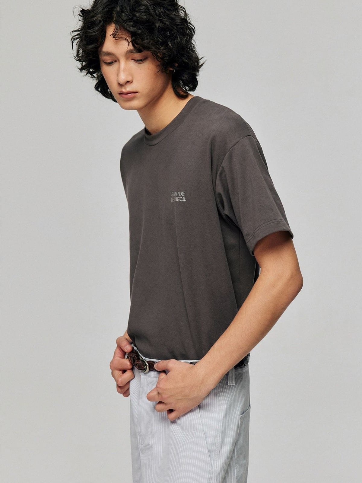 SIMPLE PROJECT Inverted Silver Logo Crewneck T Shirt in Charcoal - On Male Model
