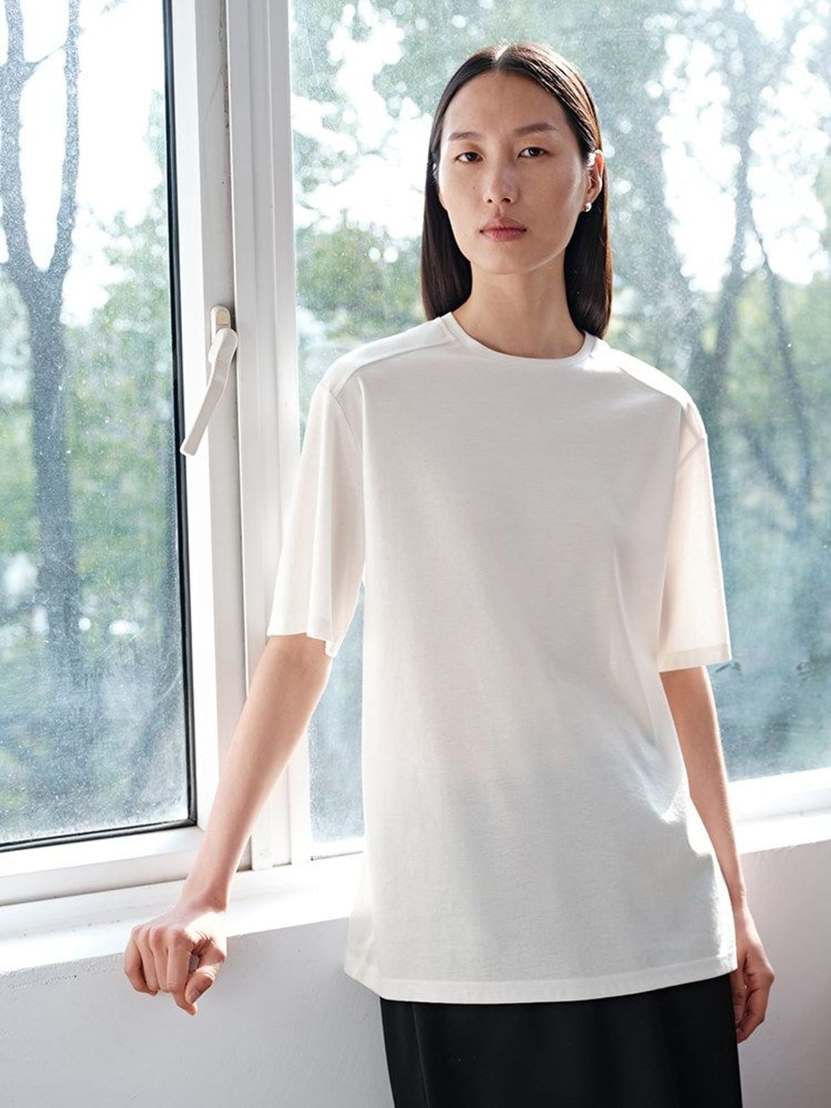 MSBEAST Oversized Lyocell Wool Blend T Shirt in White - On Female Model
