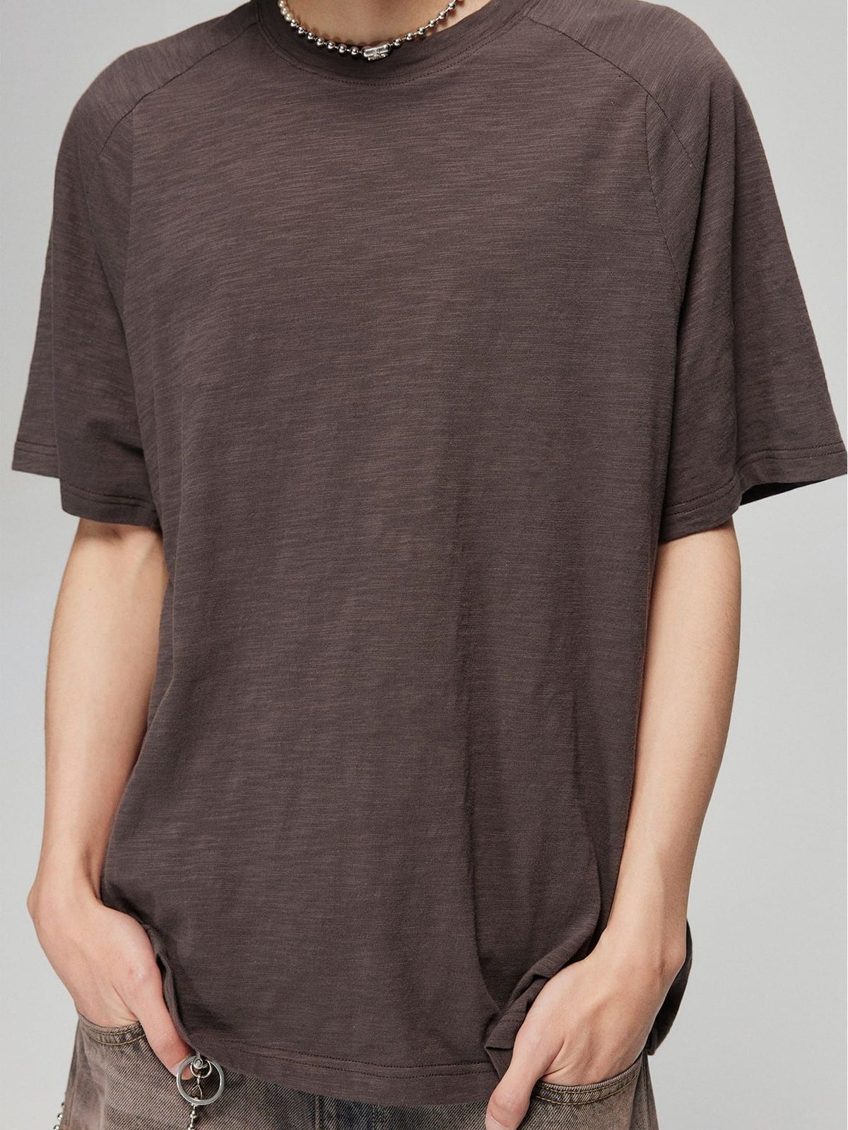SIMPLE PROJECT Washed Slub Cotton Raglan Tee in Brown - On Male Model