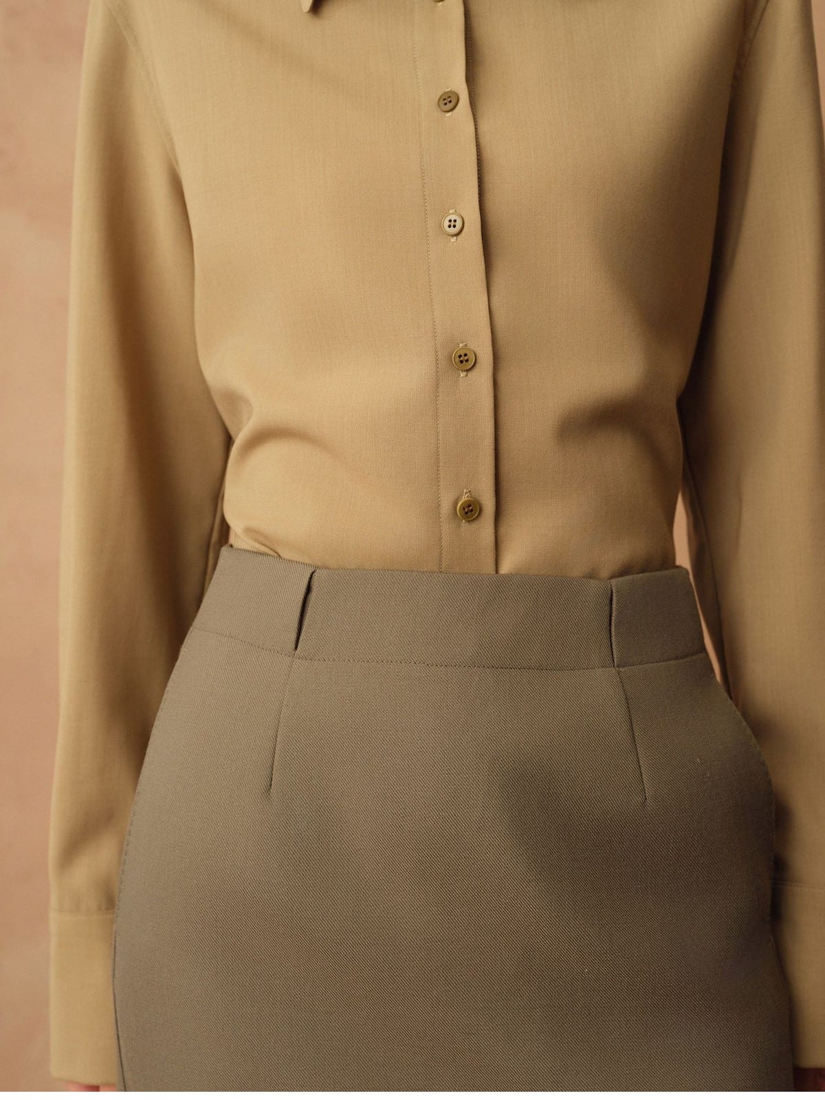 TEASEL Merino Wool Pleated Trousers in Olive - On Model