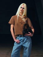 SMFK Vintage Wash Cross Graphic T Shirt in Brown - On Female Model