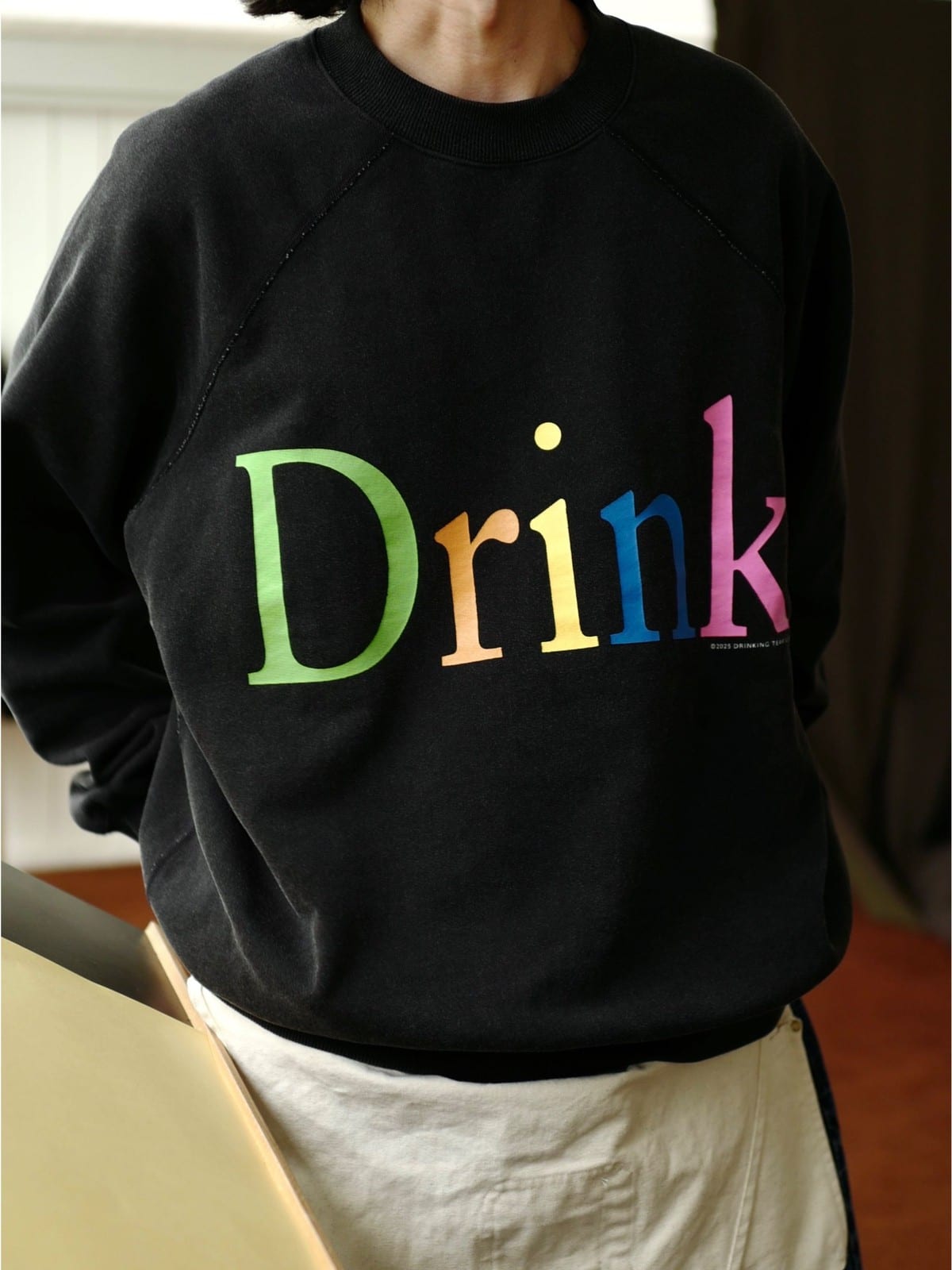 USAGE Washed Cotton Graphic Sweatshirt in Black - On Model