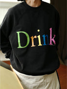 USAGE Washed Cotton Graphic Sweatshirt in Black - On Model