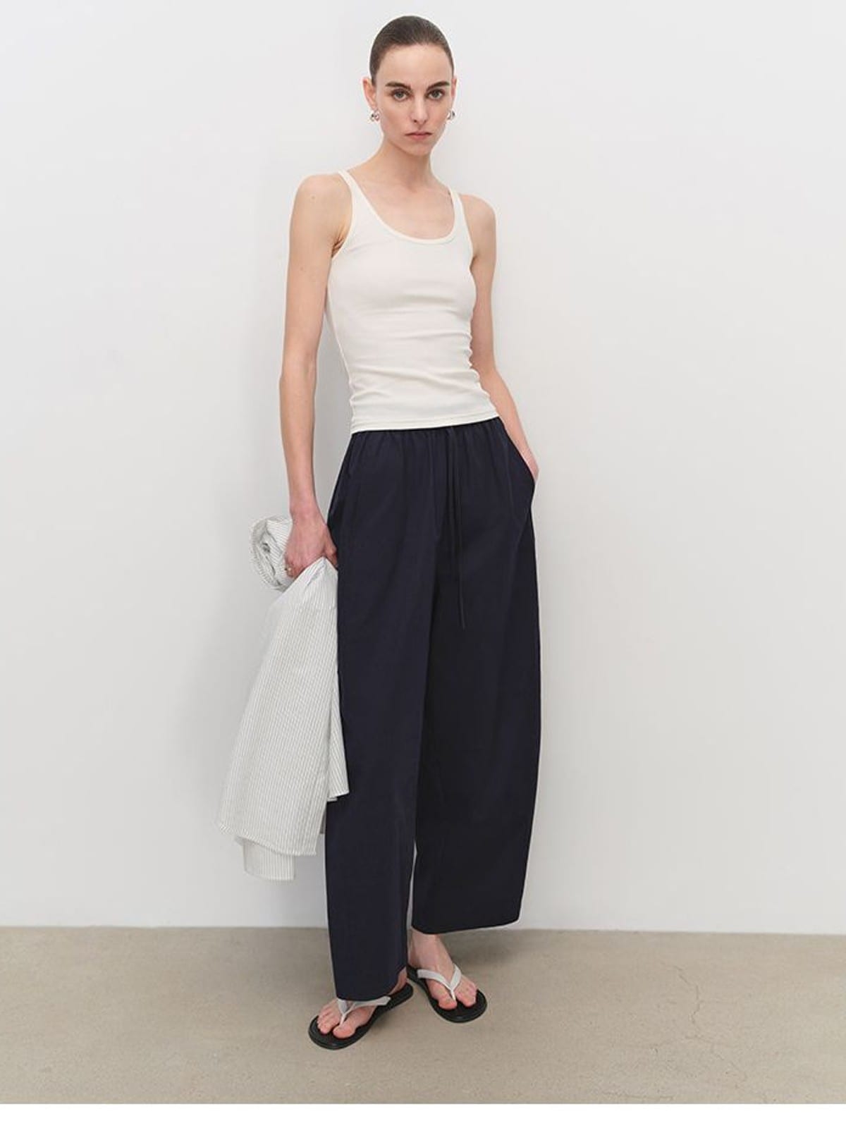 MSBEAST Paper Texture Cotton Balloon Pants in Navy Blue - On Female Model