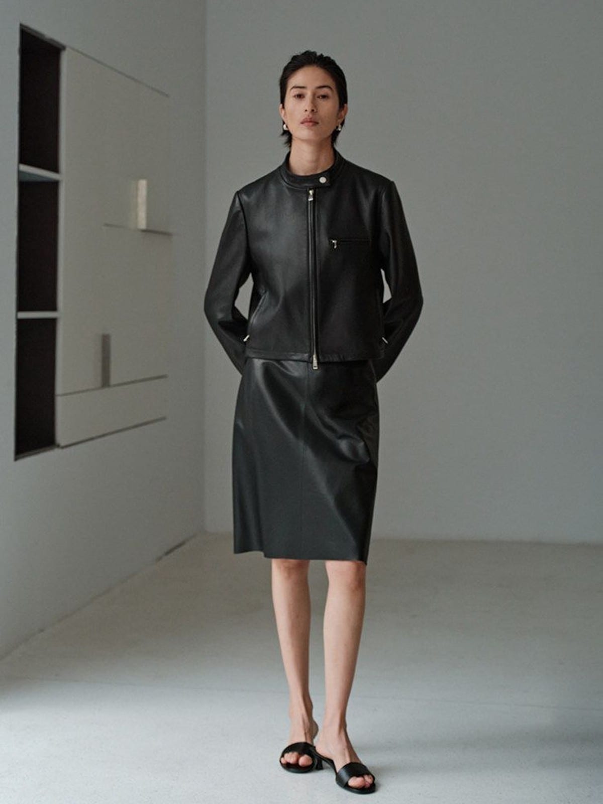 MSBEAST Suede Leather Cropped Moto Jacket in Black - On Female Model