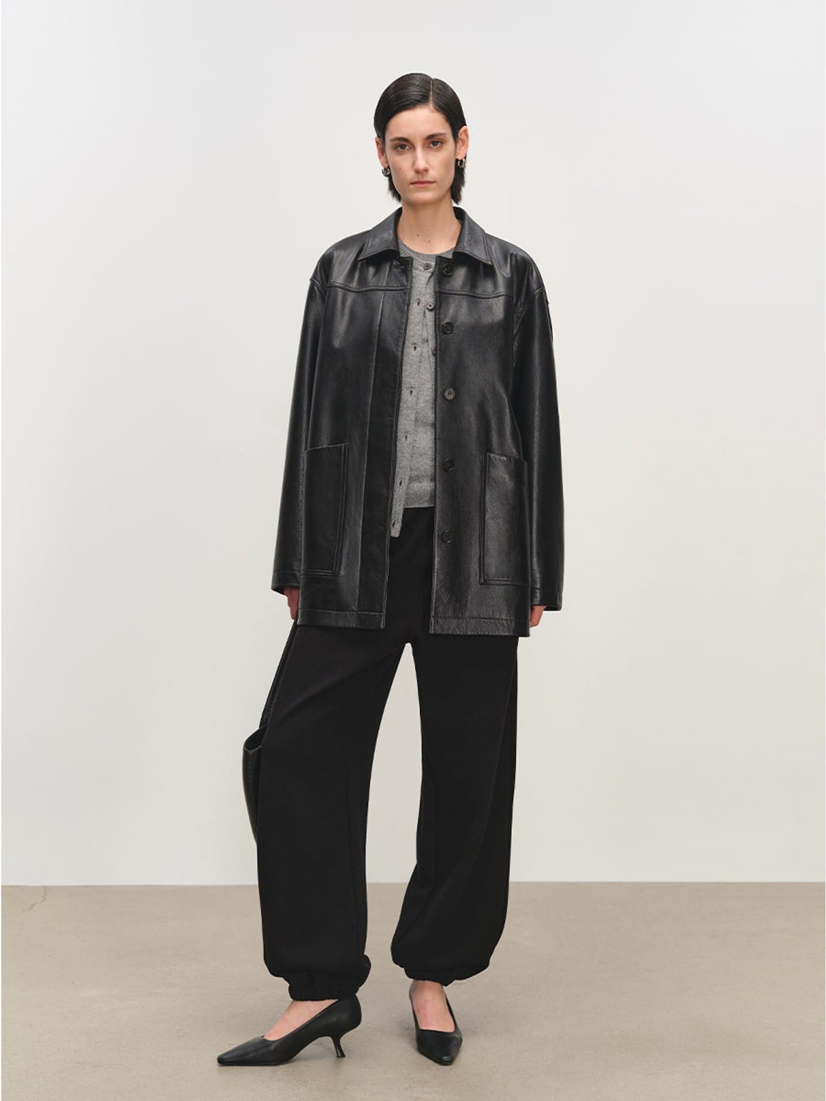 MSBEAST Mid Length Sheepskin Leather Jacket in Black - On Female Model