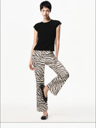 RARELY ALIKE Raglan Cap Sleeve T Shirt in Black - On Female Model