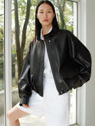 MSBEAST Oil Waxed Sheepskin Stand Collar Jacket in Black - On Female Model