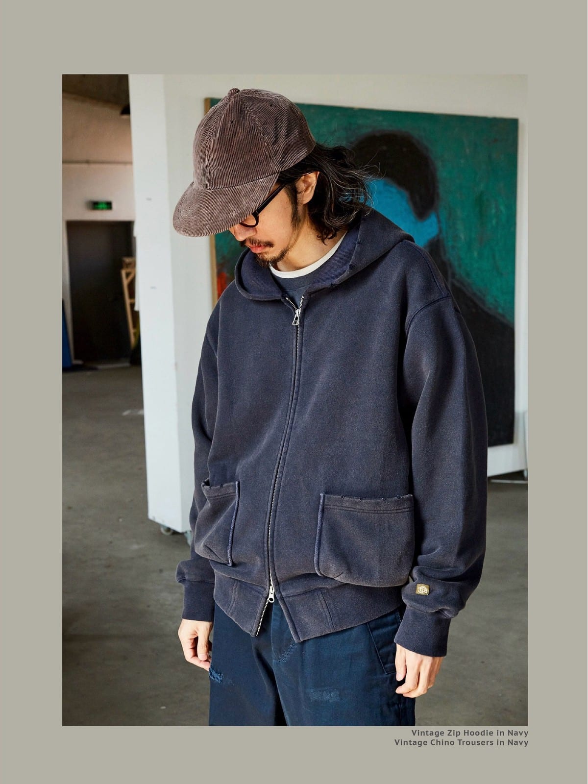 USAGE Hand Distressed Washed Zip Hoodie in Navy Blue - On Male Model