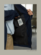 USAGE Drawstring Zip Front Tech Anorak in Navy Blue - On Male Model