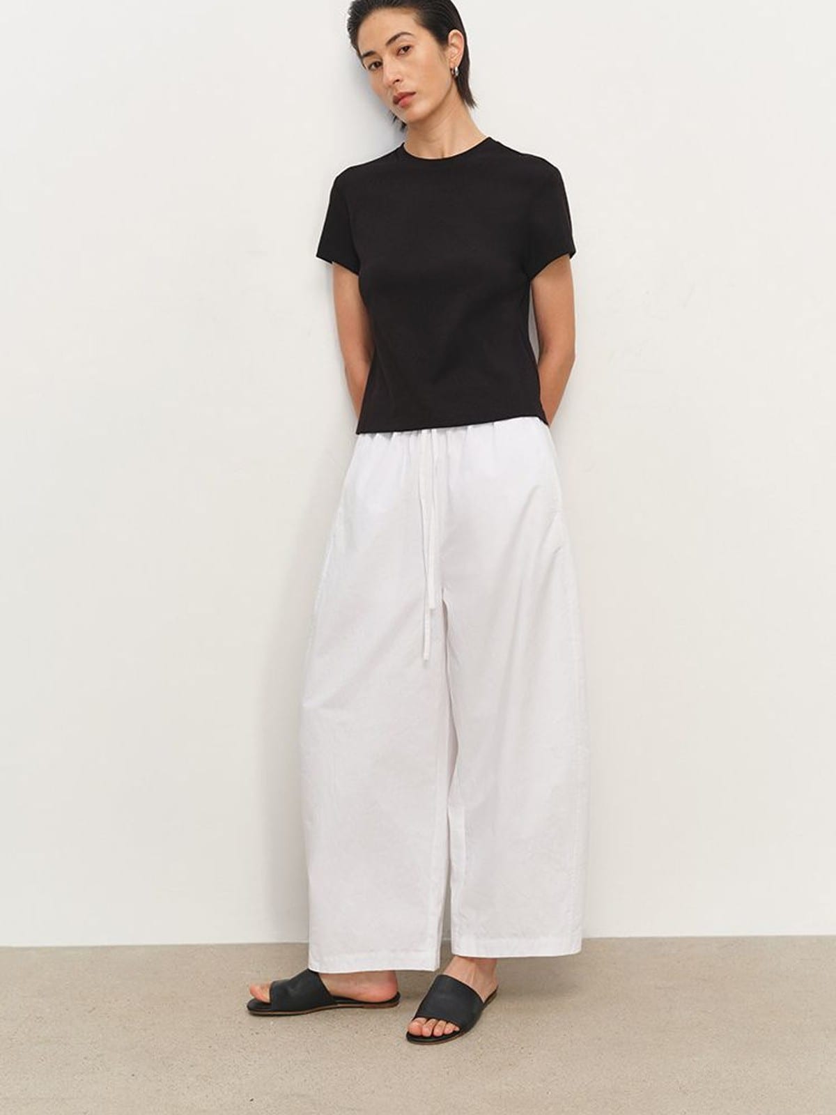 MSBEAST Cotton Blend Tapered Waist T Shirt in Black - On Female Model