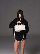 SMFK Medium Leather Cross Motif Handbag in White - On Female Model
