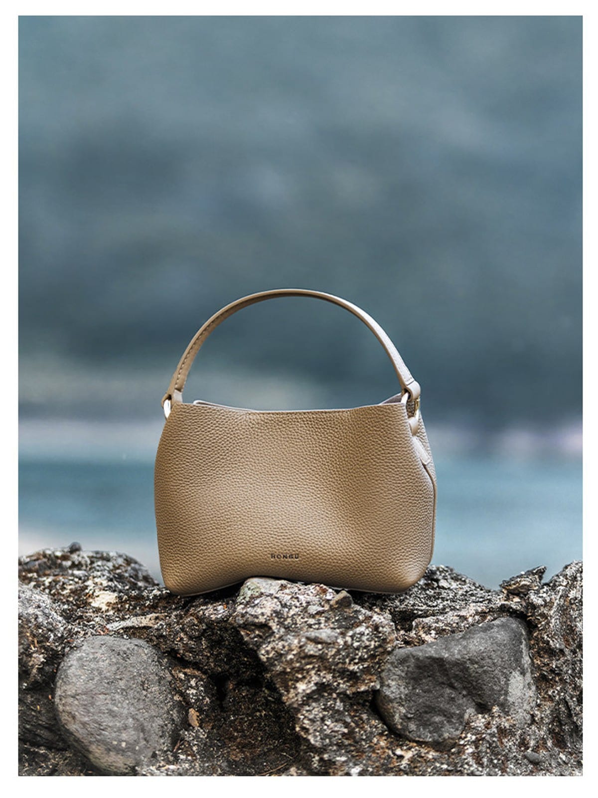 HONGU Cowhide Crossbody Bucket Bag in Taupe - Lifestyle