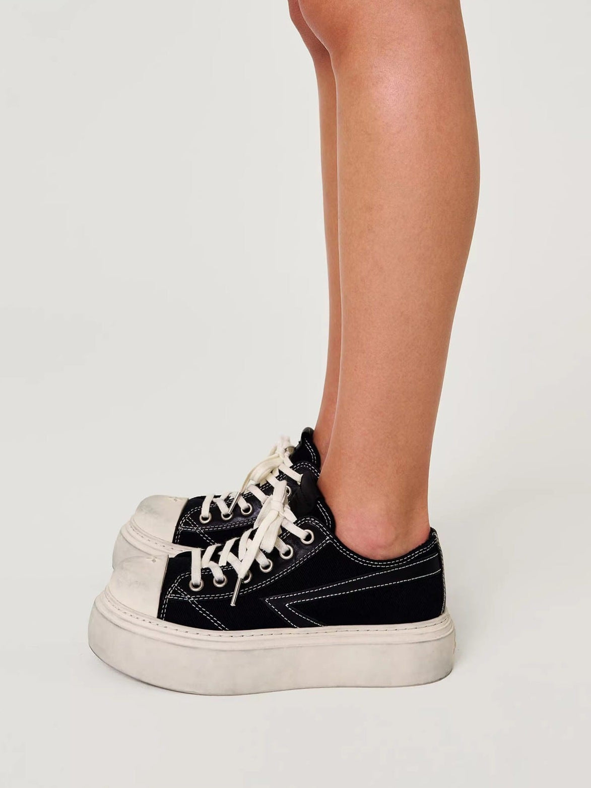 SMFK Distressed Canvas Skate Sneakers in Black - On Model