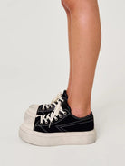 SMFK Distressed Canvas Skate Sneakers in Black - On Model