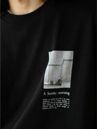 USAGE Air Spun Cotton Graphic T Shirt in Black - On Model