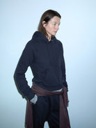 Random Piece Cotton Lyocell Cropped Hoodie in Navy Blue - On Female Model