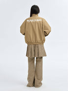 MEDM Nylon Stand Collar Coach Jacket in Beige - On Model
