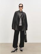 MSBEAST Drawstring Sheep Leather Jacket in Black - On Female Model