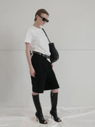 RARELY ALIKE Tailored Bermuda Shorts in Black - On Female Model