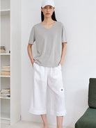 MSBEAST Rolled Edge Silk Cotton U Neck T Shirt in Gray - On Female Model