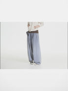 MASONPRINCE Wide Leg Inverted Pleat Sweatpants in Purple - On Model