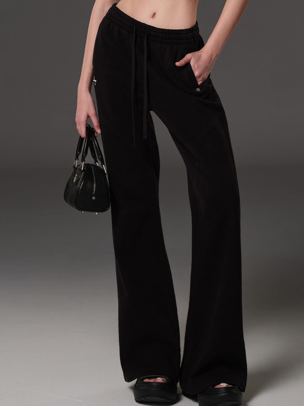 SMFK Cotton Blend Flared Sweatpants in Black - On Female Model