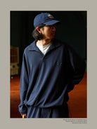 USAGE Oversized Textured Long Sleeve Polo in Navy Blue - On Male Model