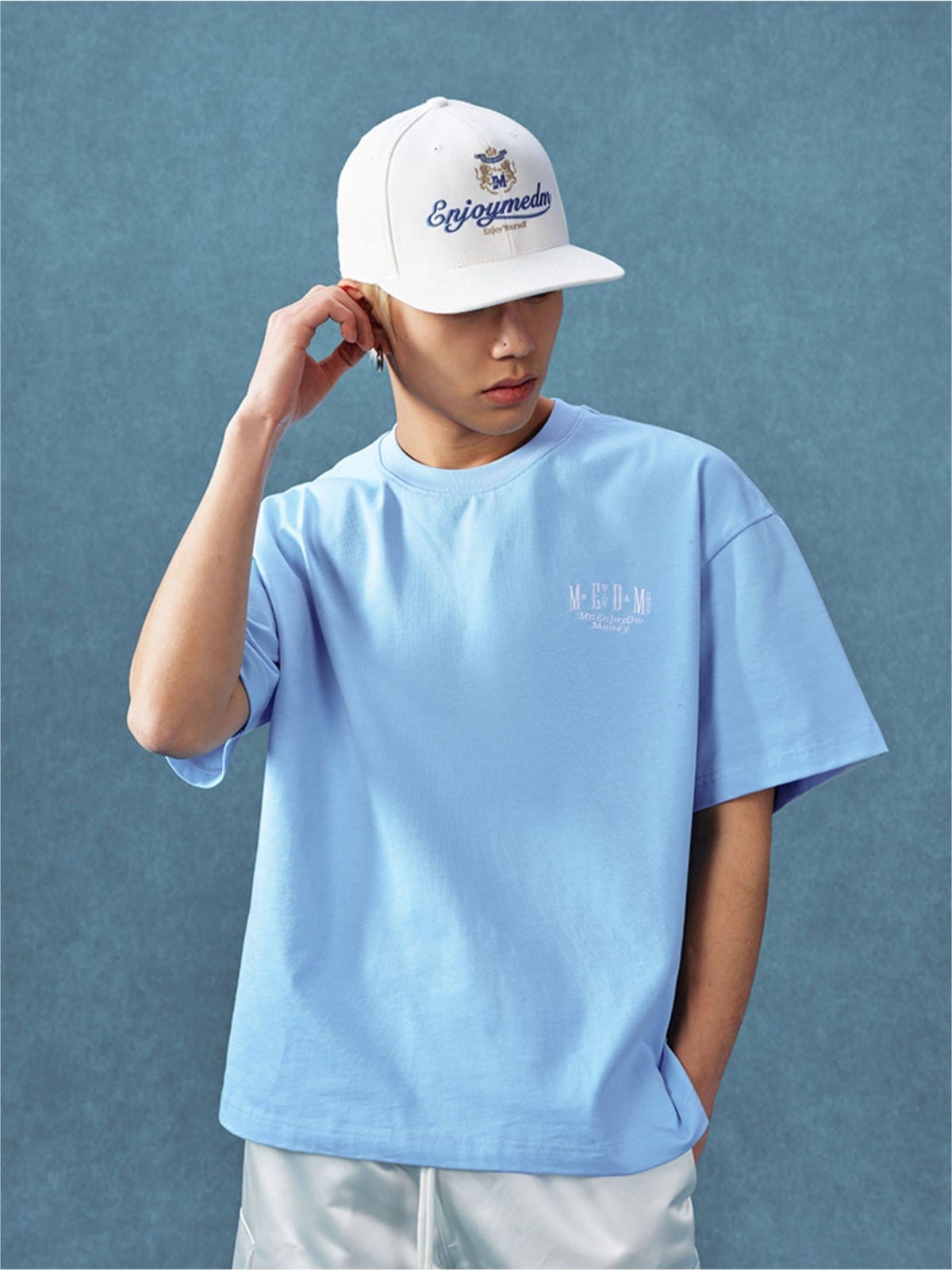 MEDM Letter Embroidery Cotton T Shirt in Sky Blue - On Male Model