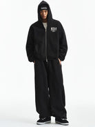 MEDM 3D Logo Two Way Zip Cotton Hoodie in Black - On Male Model