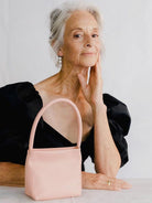 PANLULUPAN Waxed Cowhide Square Shoulder Bag in Pink - On Female Model
