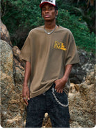 MEDM Half Sleeve Cotton Logo T Shirt in Dark Gray - On Male Model