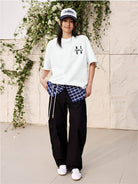 MEDM Tufted Logo Cotton T Shirt in White - On Female Model