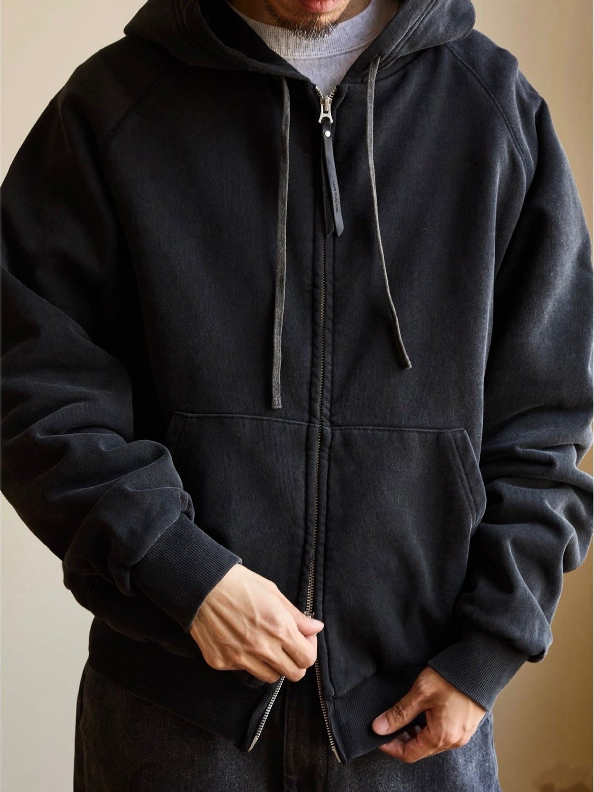 USAGE Vintage Washed Double Layer Zip Hoodie in Black - On Male Model