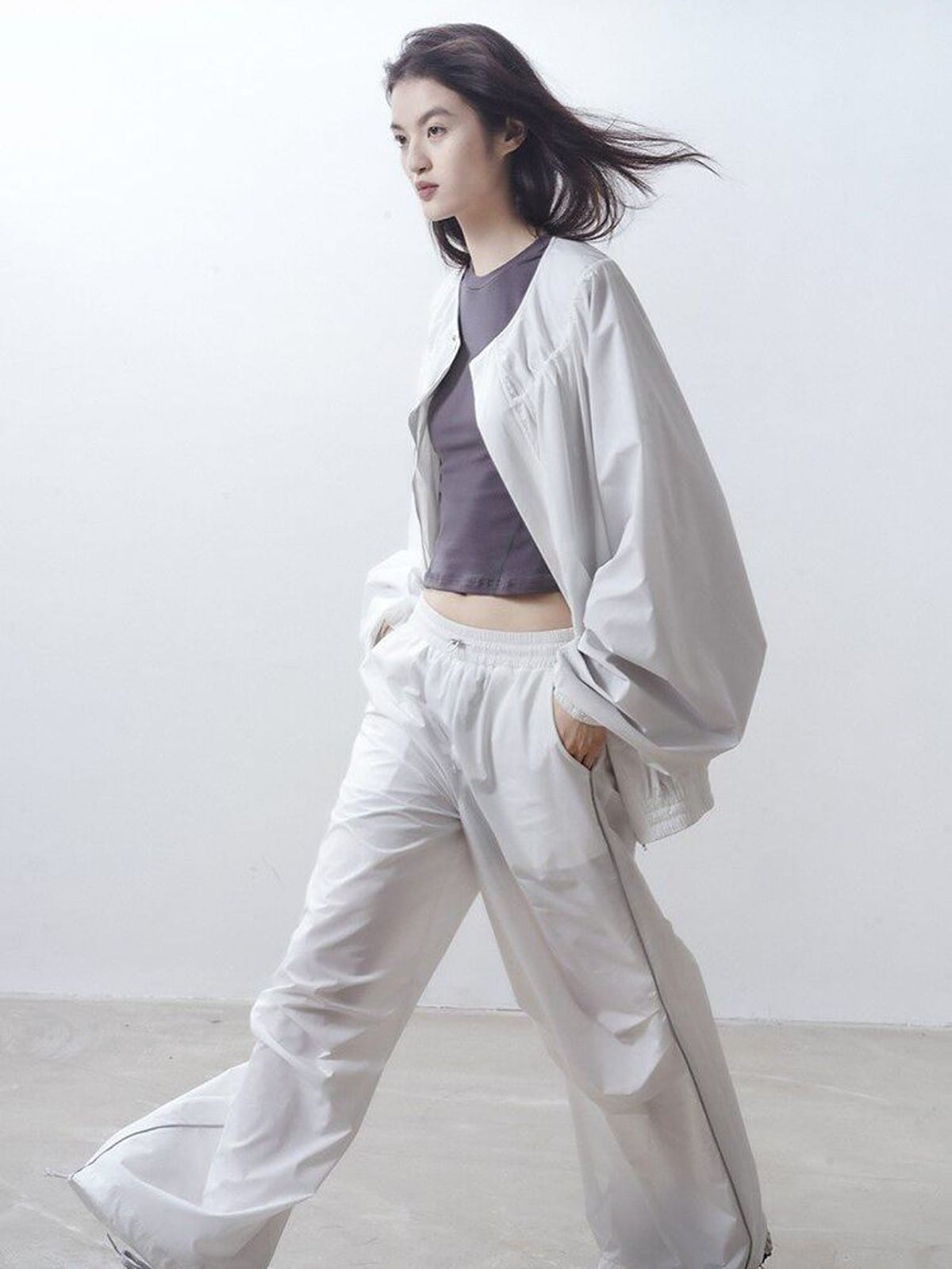 RARELY ALIKE Adjustable Collar Balloon Sports Jacket in White - On Female Model