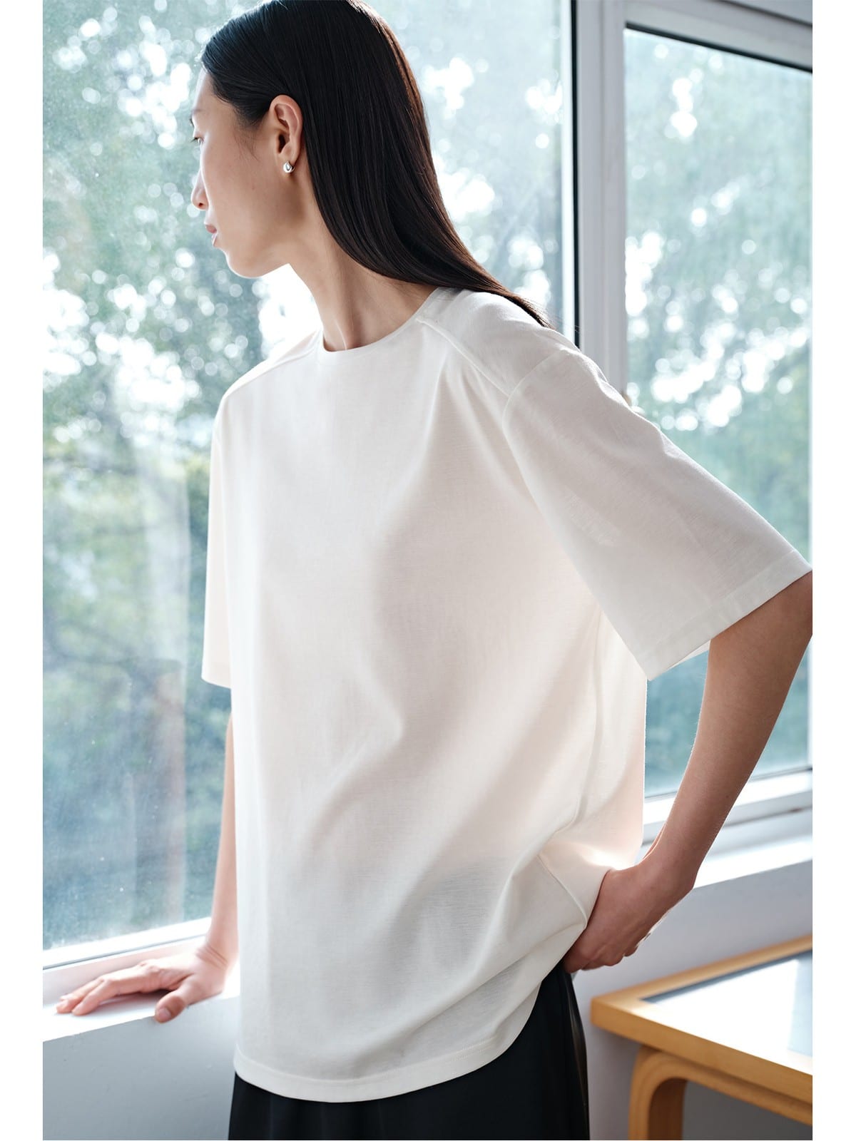 MSBEAST Oversized Lyocell Wool Blend T Shirt in White - On Female Model