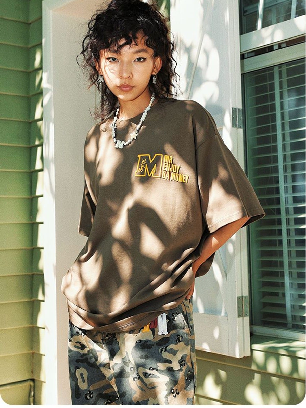MEDM Half Sleeve Cotton Logo T Shirt in Dark Gray - On Female Model